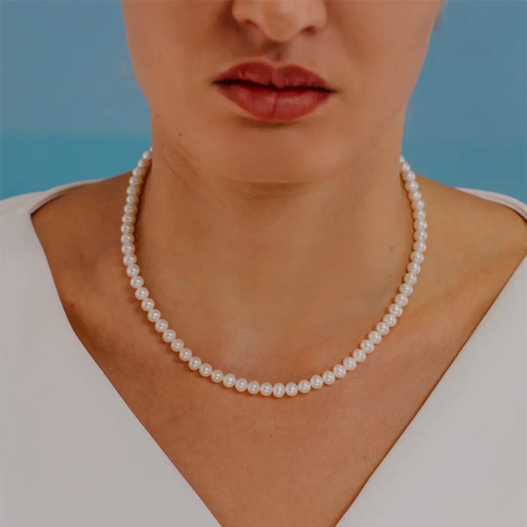 Collana Comete Filo Perle Acquadolce Oro 18k FWQ 104