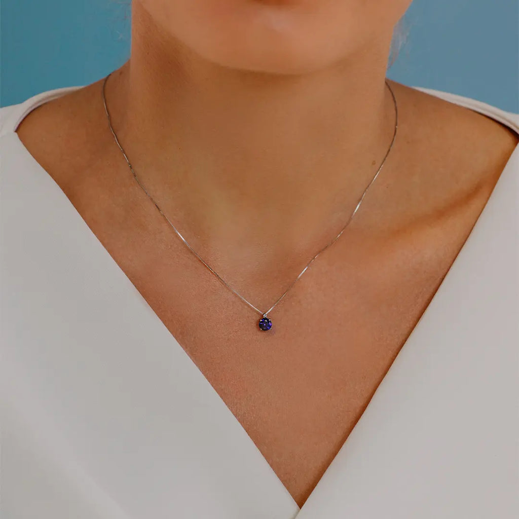 Collana Comete Gioielli Oro Bianco 18k Diamante e Zaffiro Blu Tondo GLB 1388