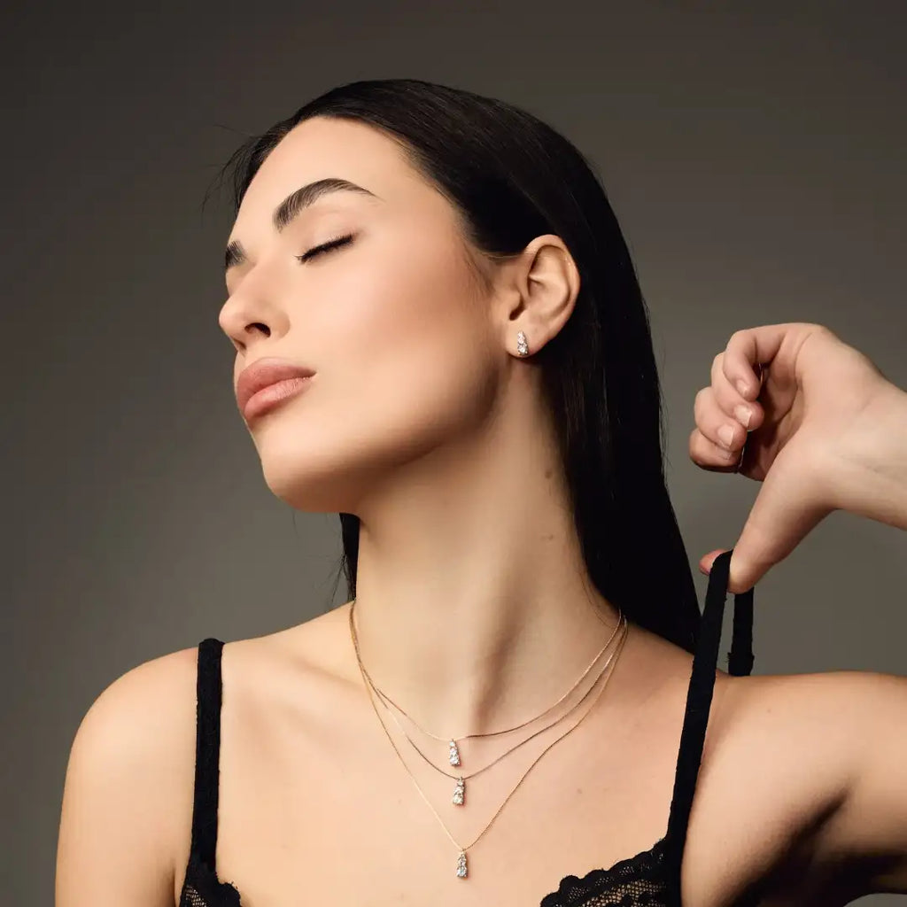 Orecchini Dilvdò Drop Stud Degradè Dorato Zirconi Bianchi